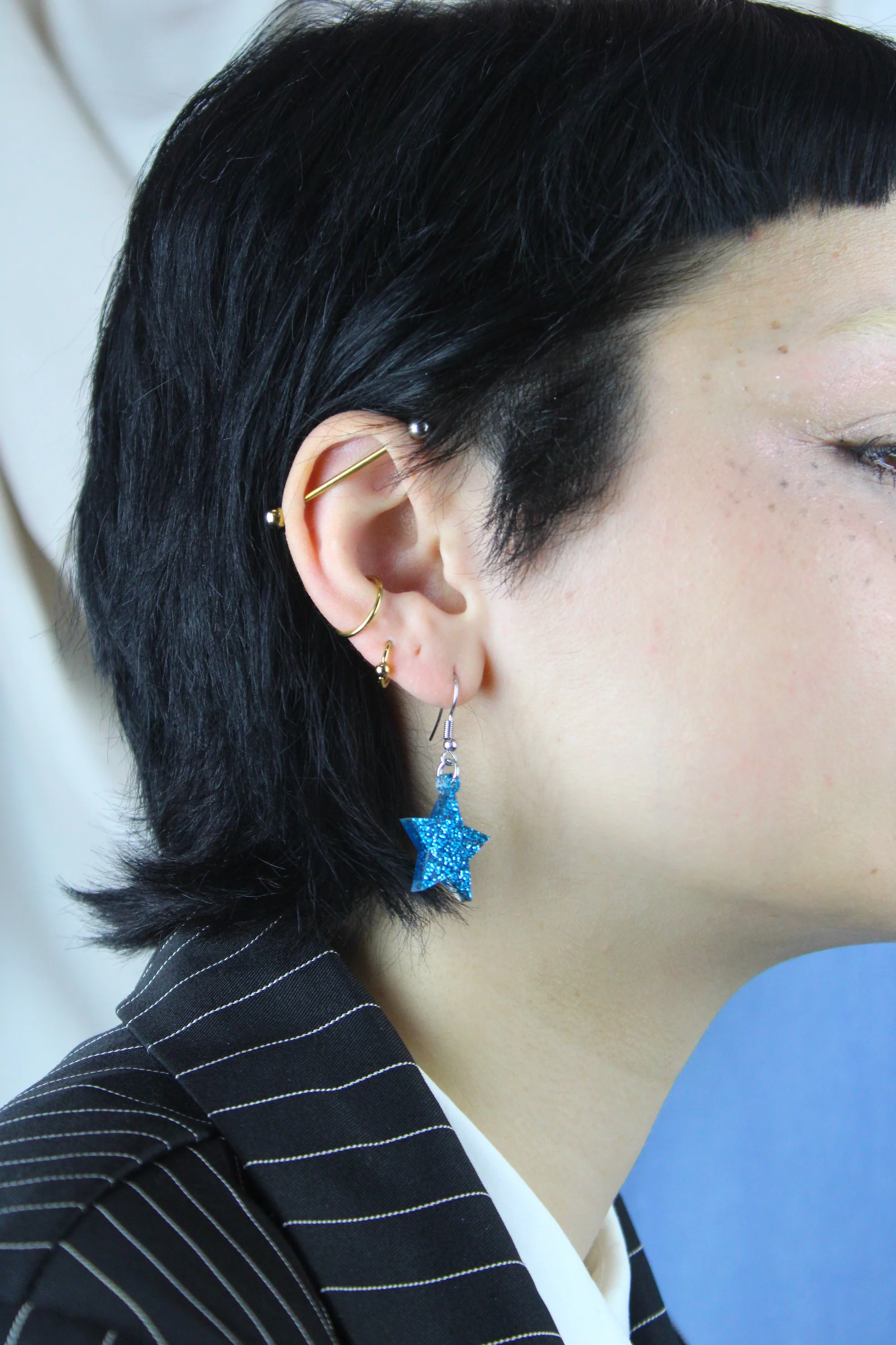 All That Glitters Blue Star Earrings - Image 3