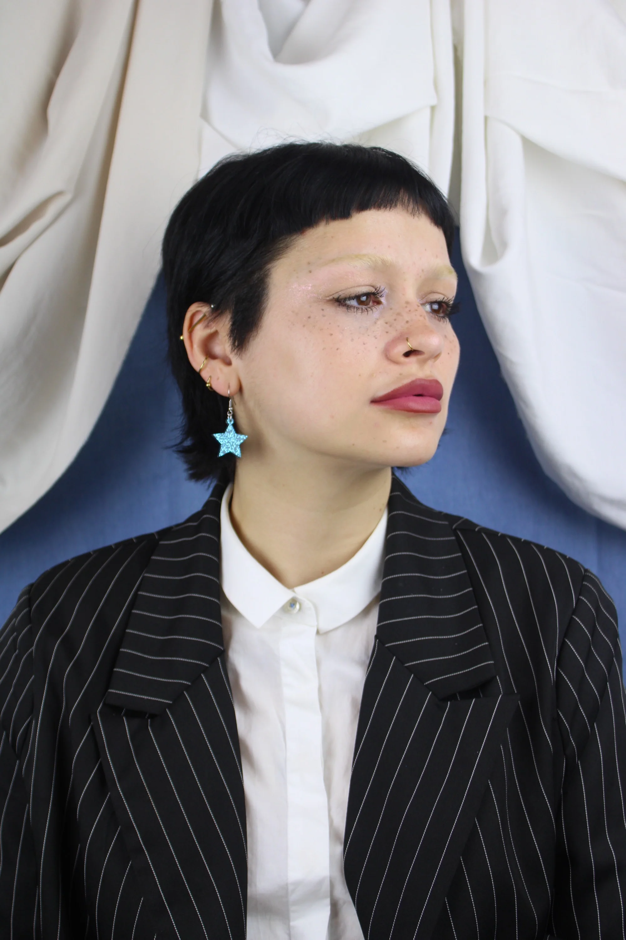 All That Glitters Blue Star Earrings - Image 7