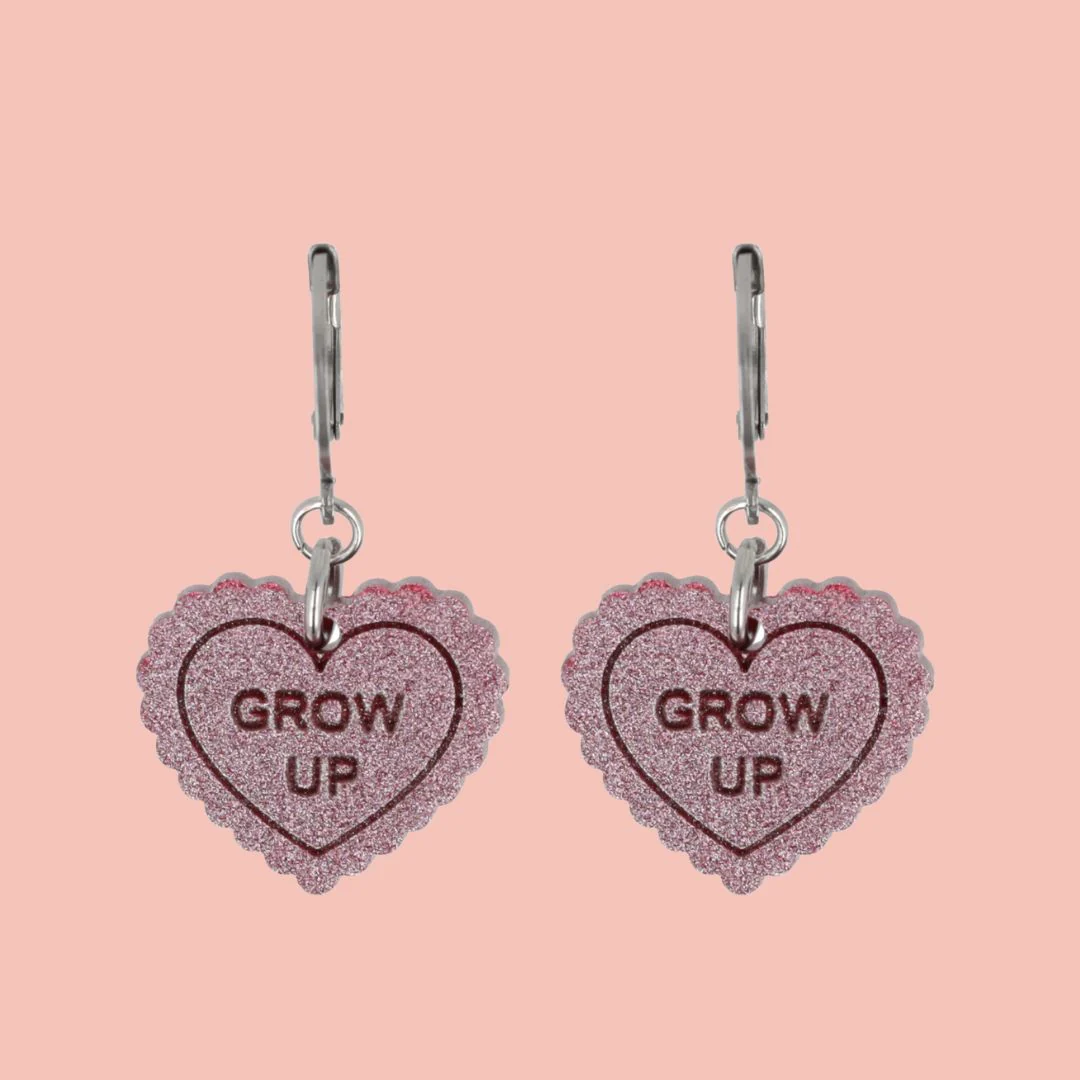 "Grow Up" Loveheart Huggie Hoop Earrings - Pink