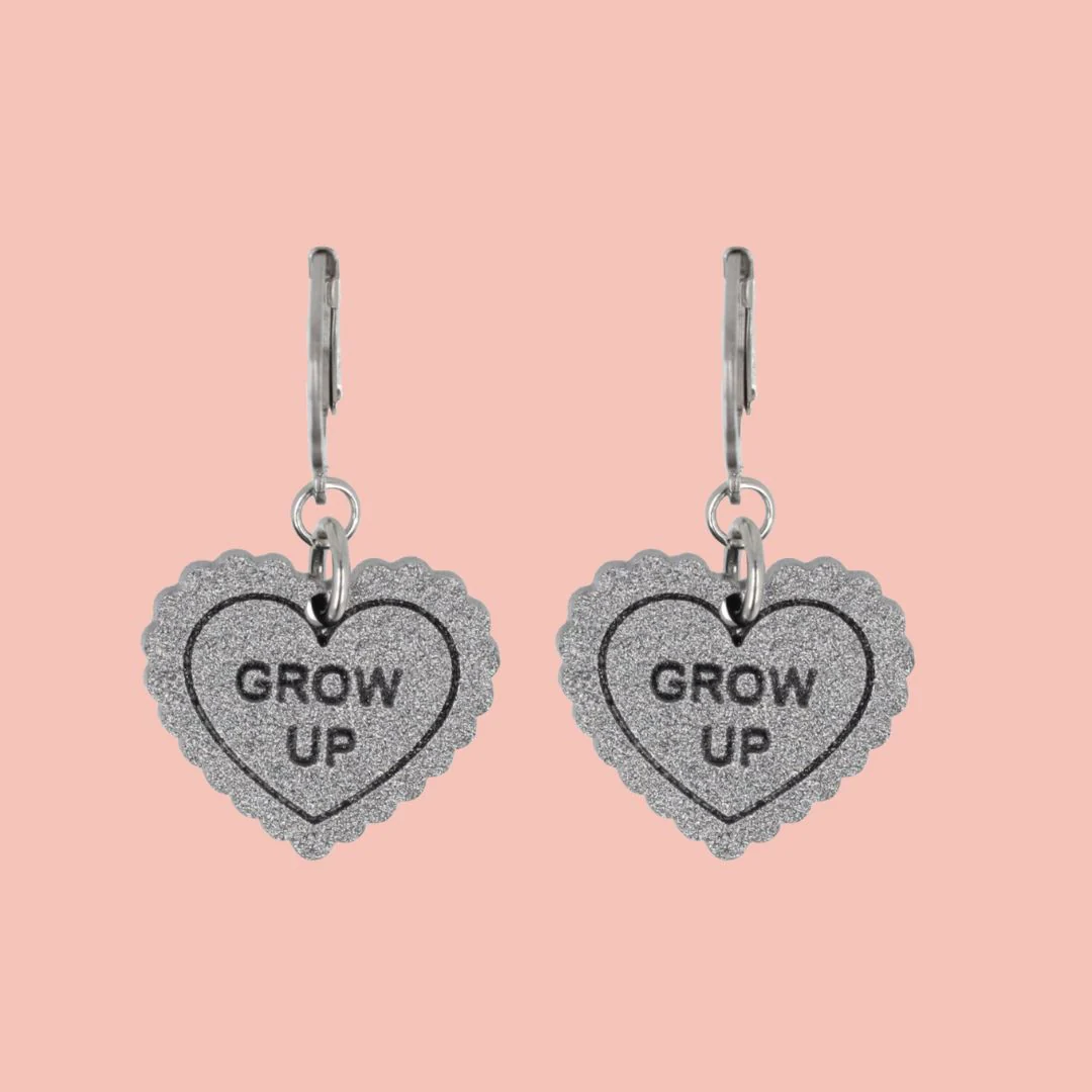 "Grow Up" Loveheart Huggie Hoop Earrings - Silver