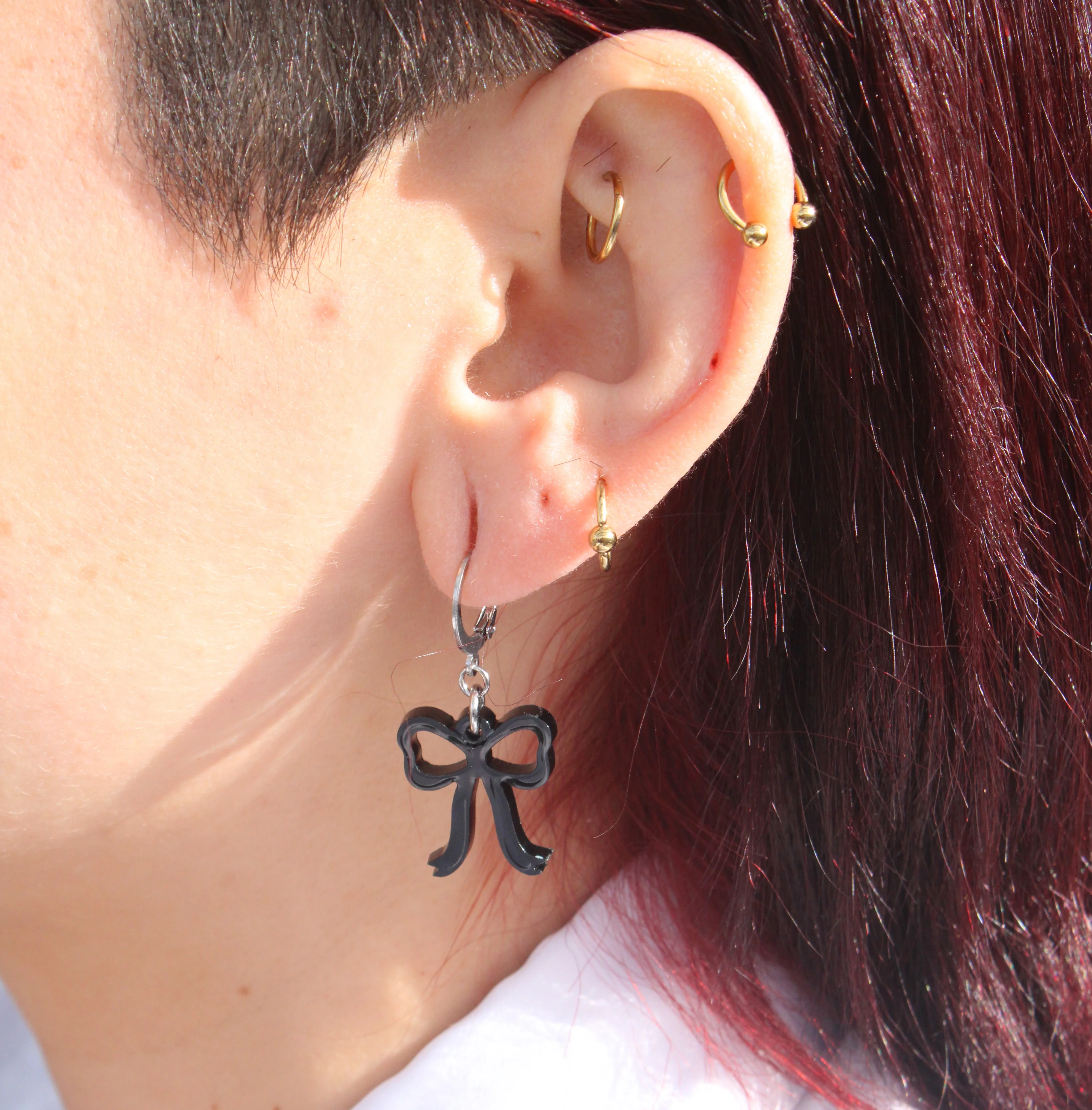 Mini Black Bow Huggie Hoop Earrings - Image 2