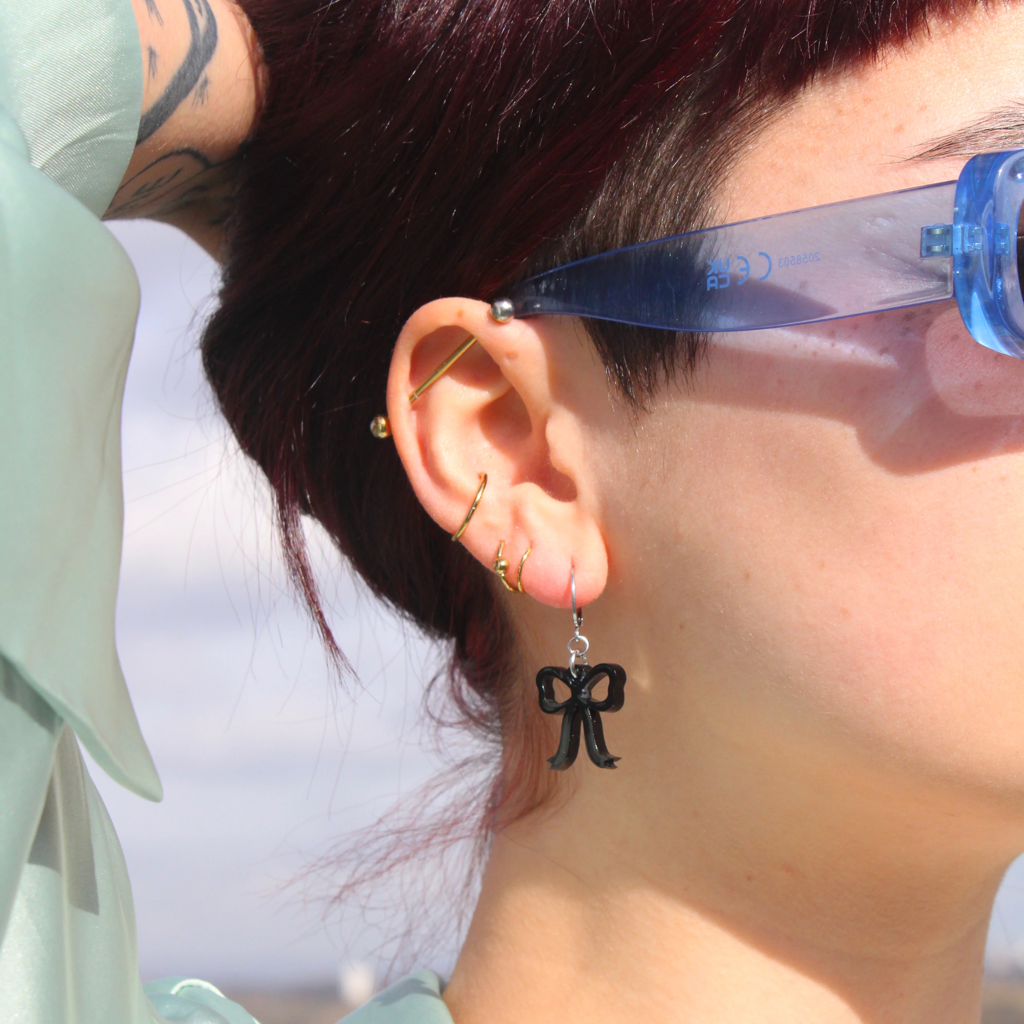 Mini Black Bow Huggie Hoop Earrings - Image 5