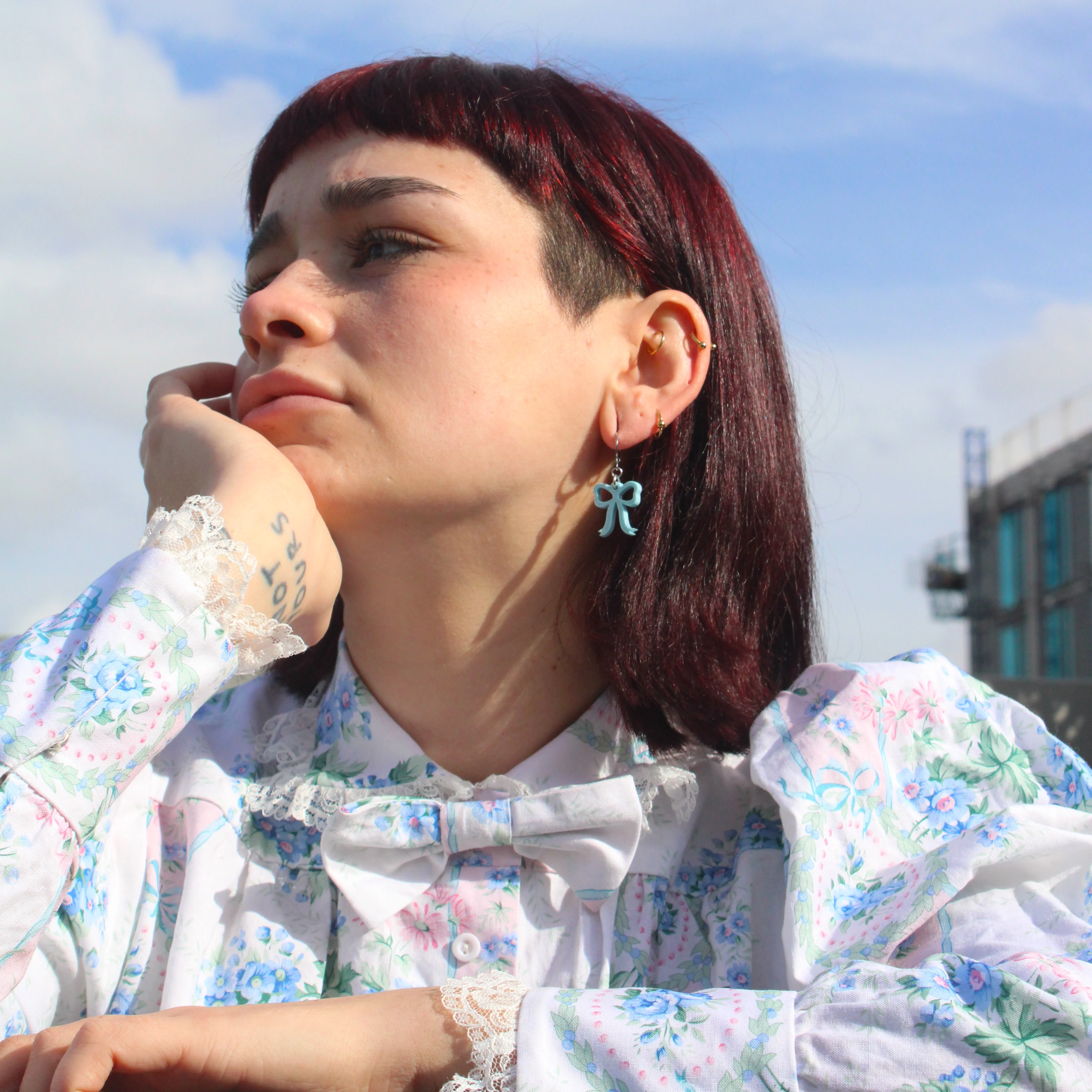 Mini Blue Bow Huggie Hoop Earrings - Image 4