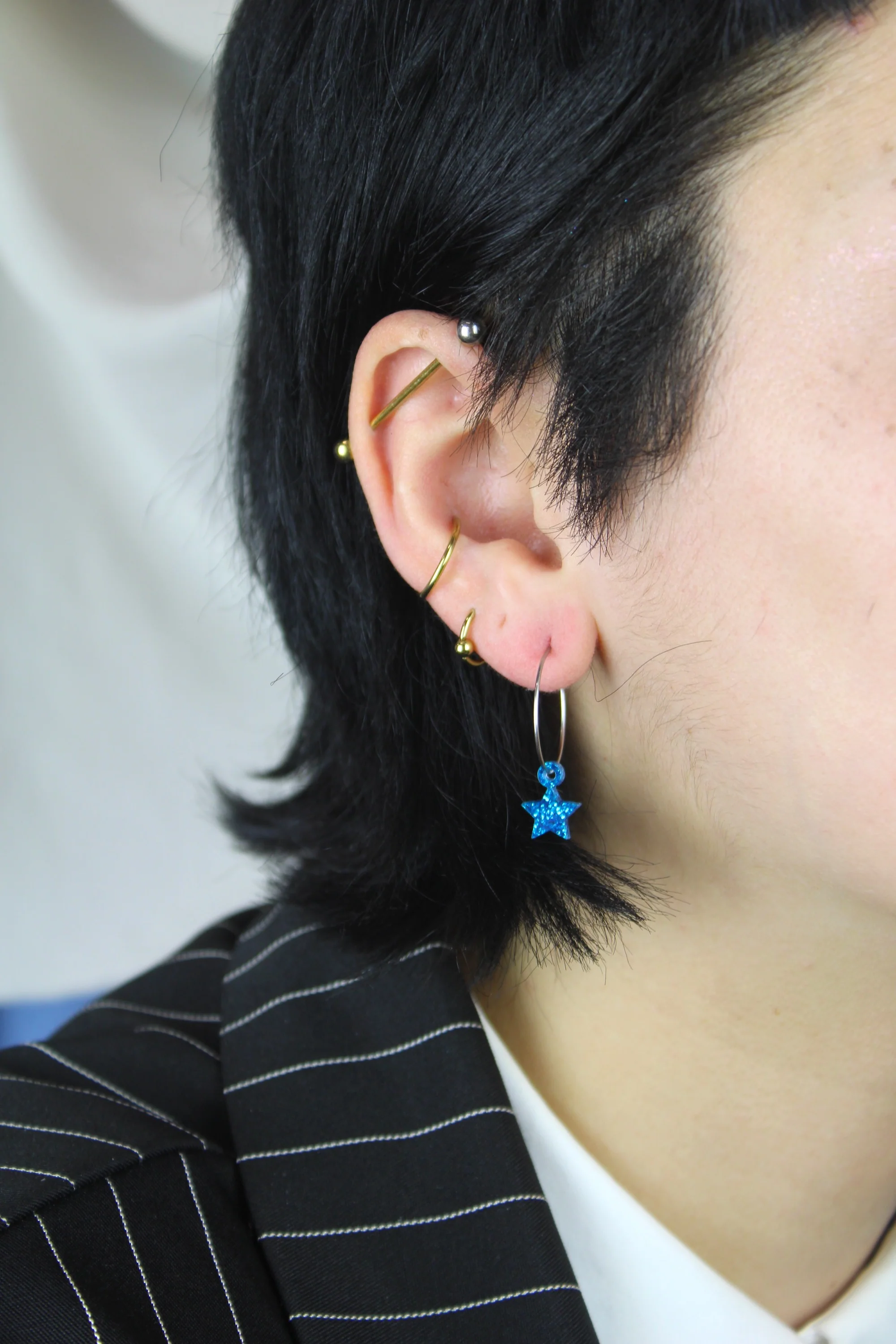 Mini Blue Glitter Star Hoop Earrings - Image 2