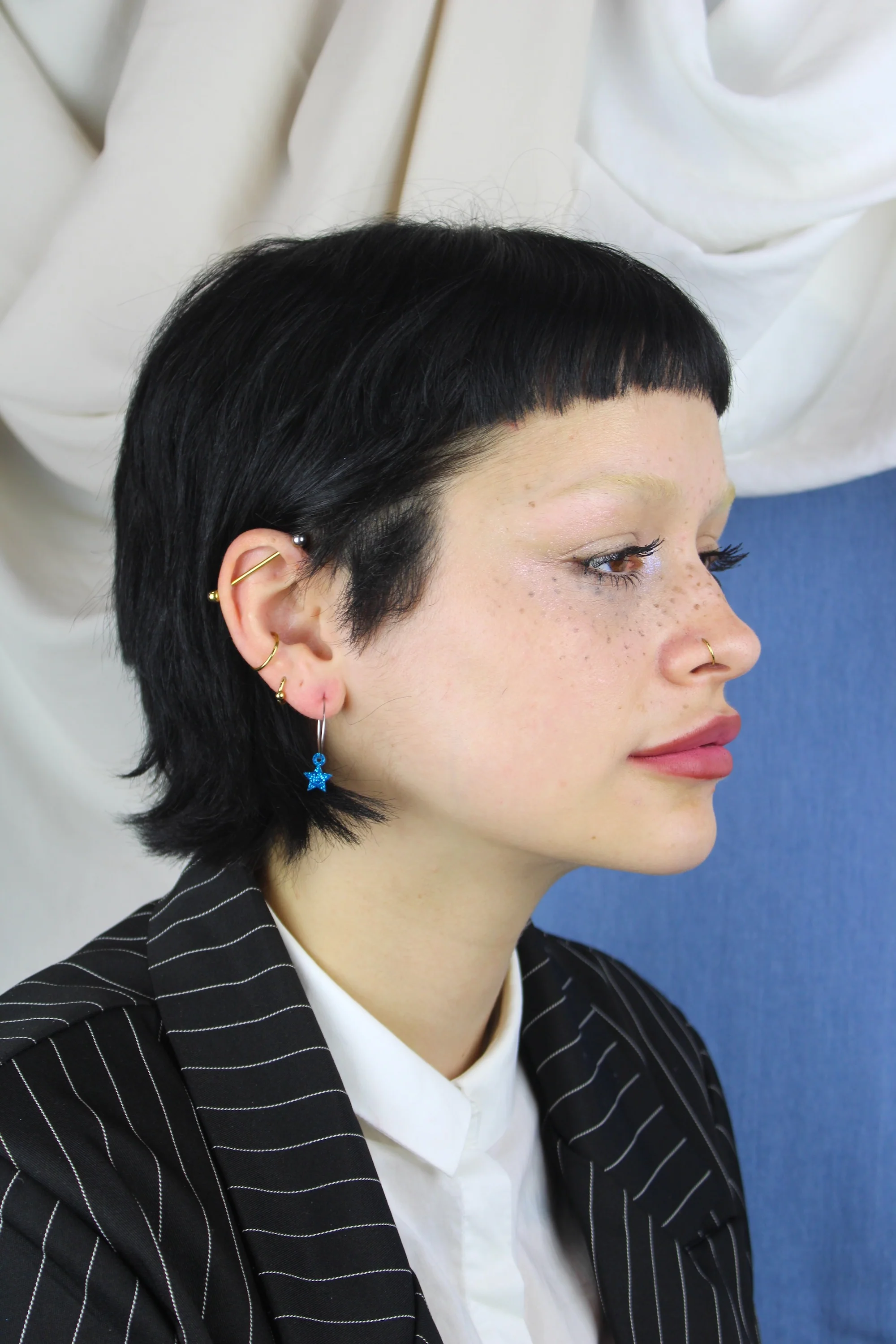 Mini Blue Glitter Star Hoop Earrings - Image 7