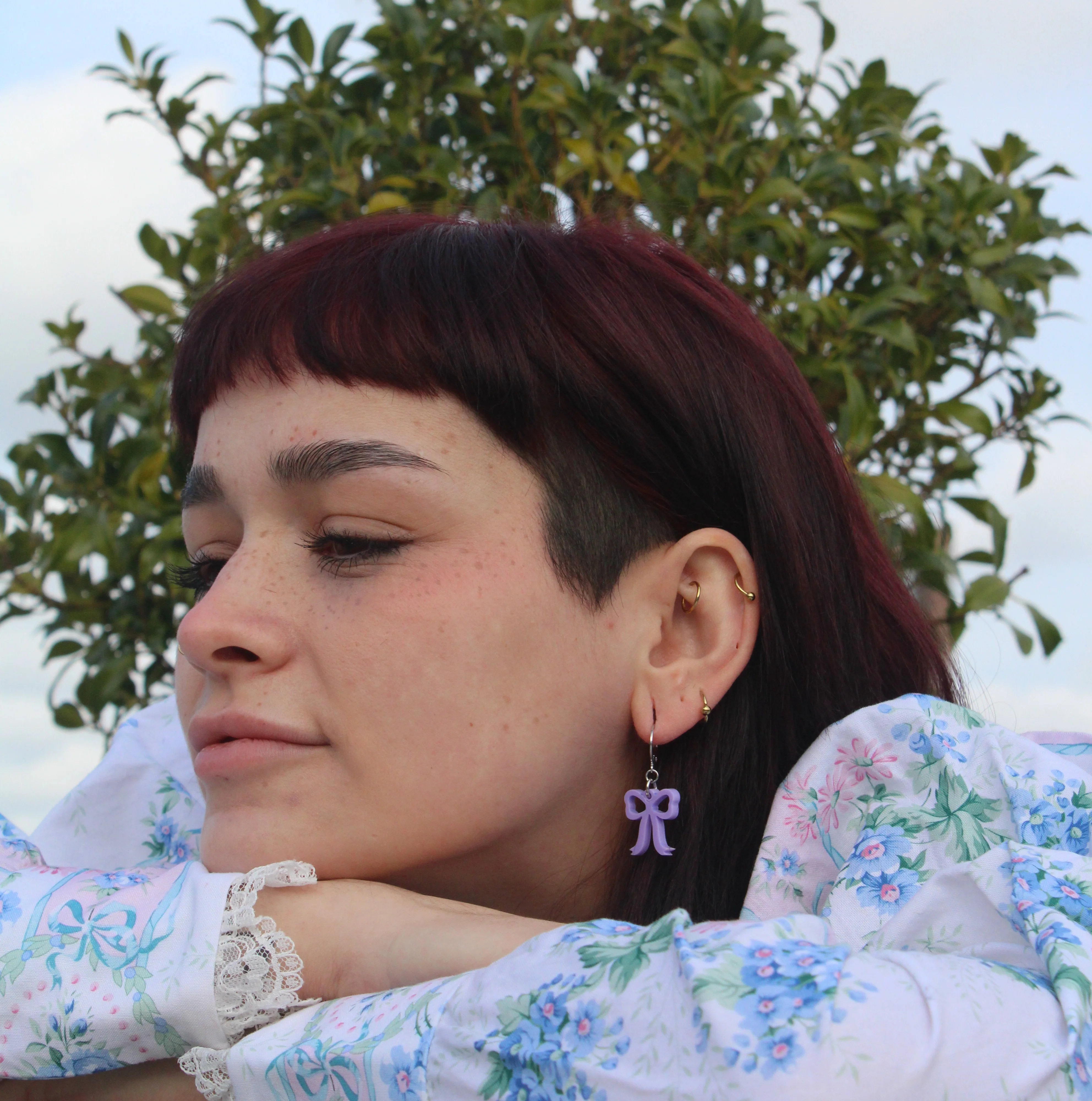 Mini Lilac Bow Huggie Hoop Earrings - Image 4