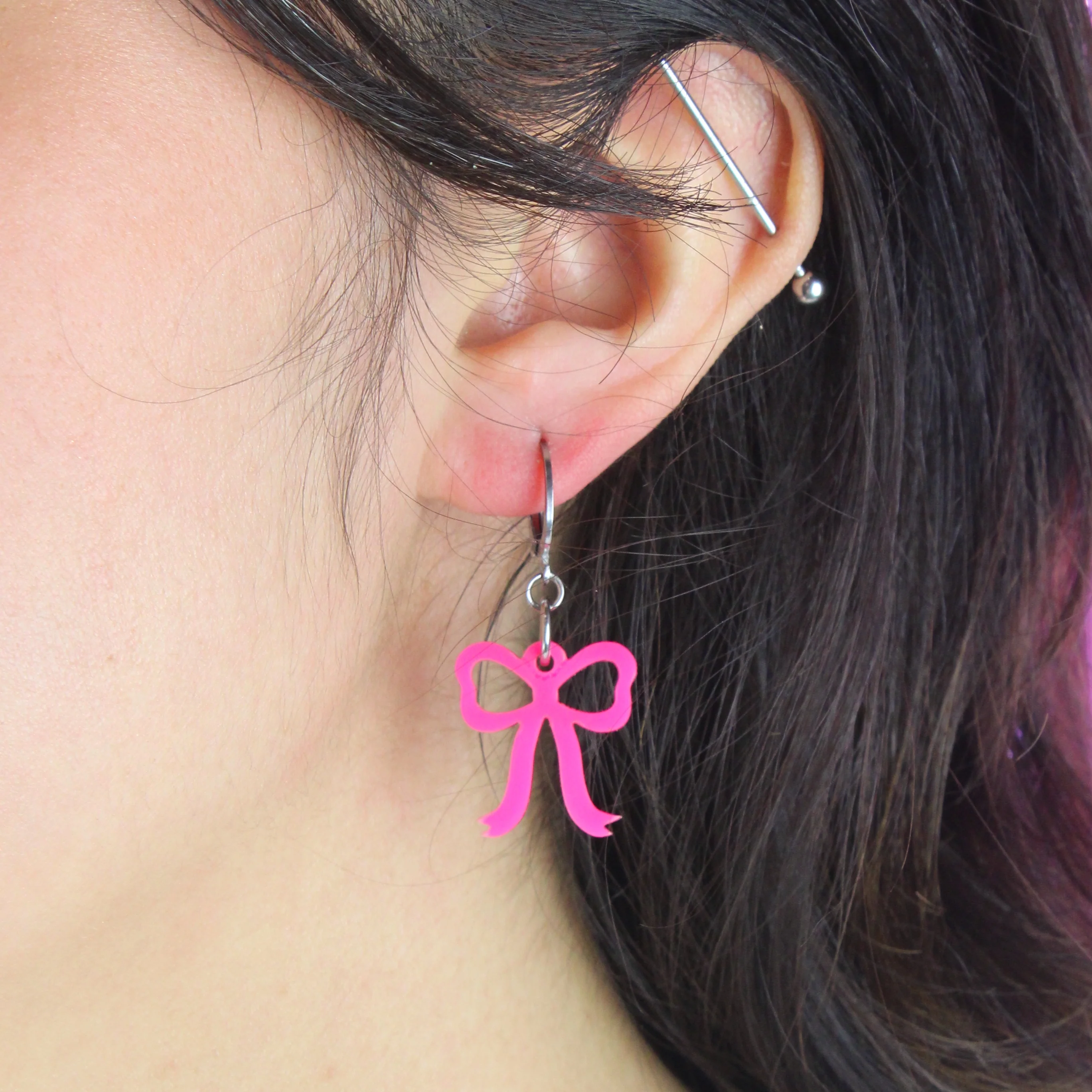 Mini Pink Bow Huggie Hoop Earrings - Image 4