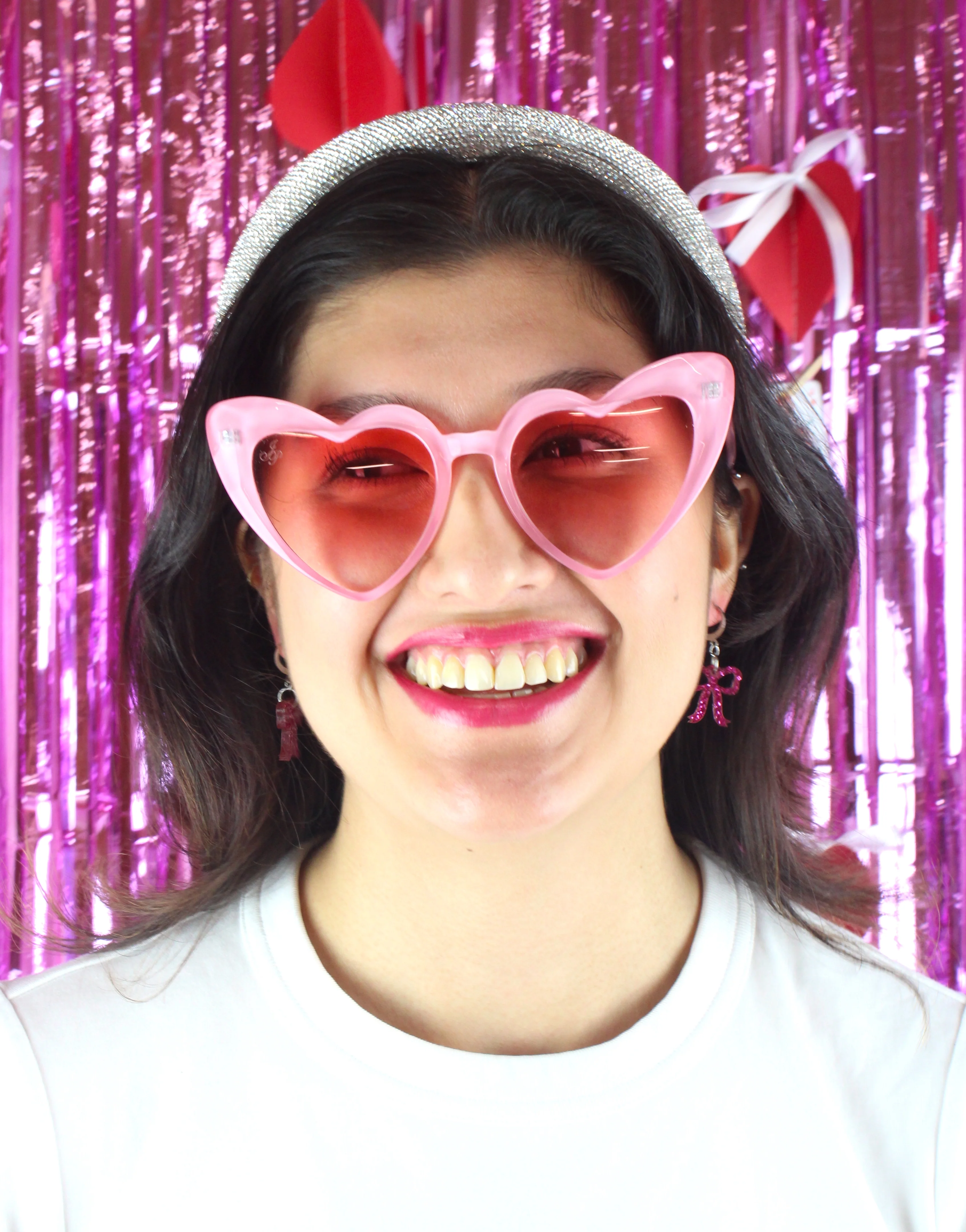 Mini Pink Glitter Bow Huggie Hoop Earrings - Image 4