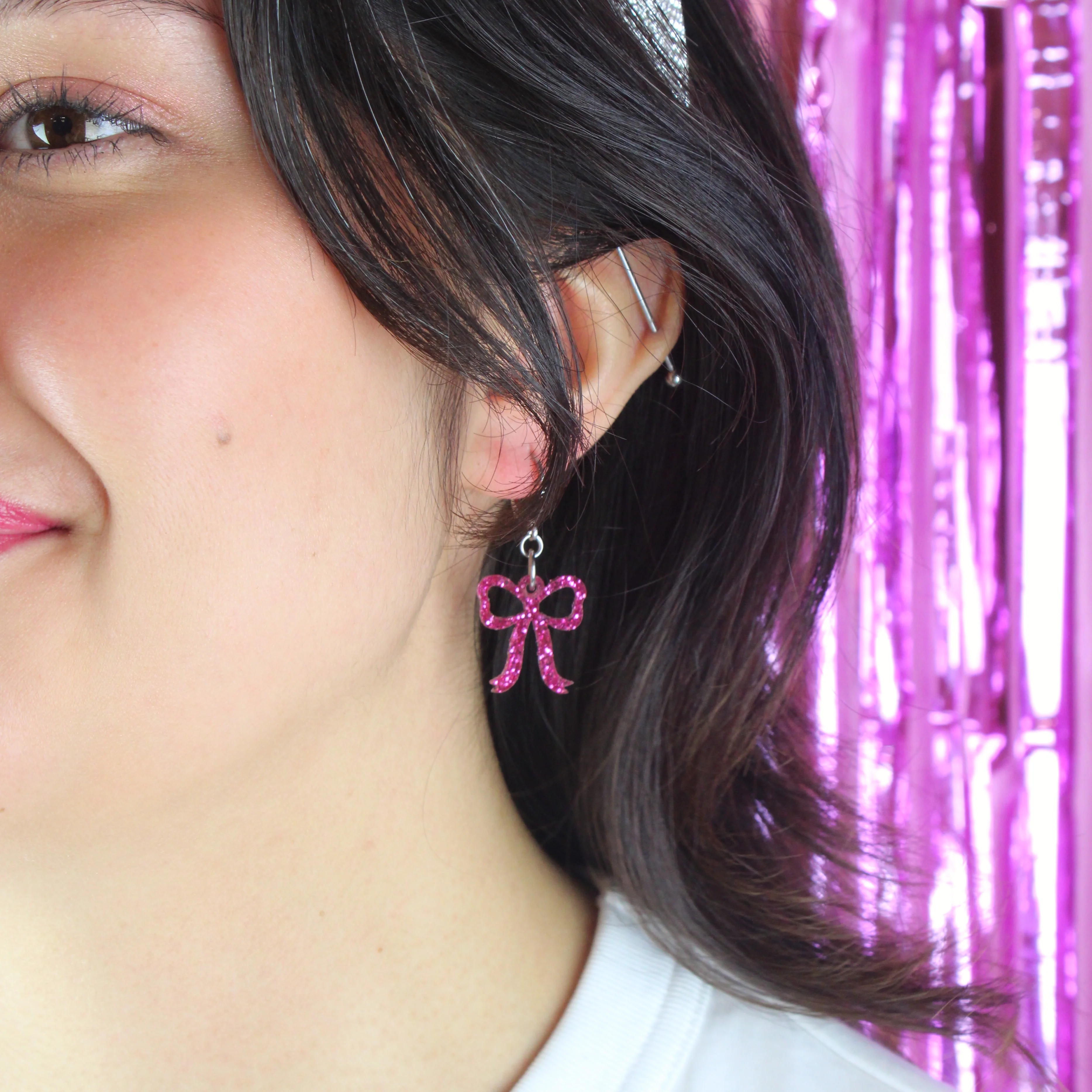 Mini Pink Glitter Bow Huggie Hoop Earrings - Image 6