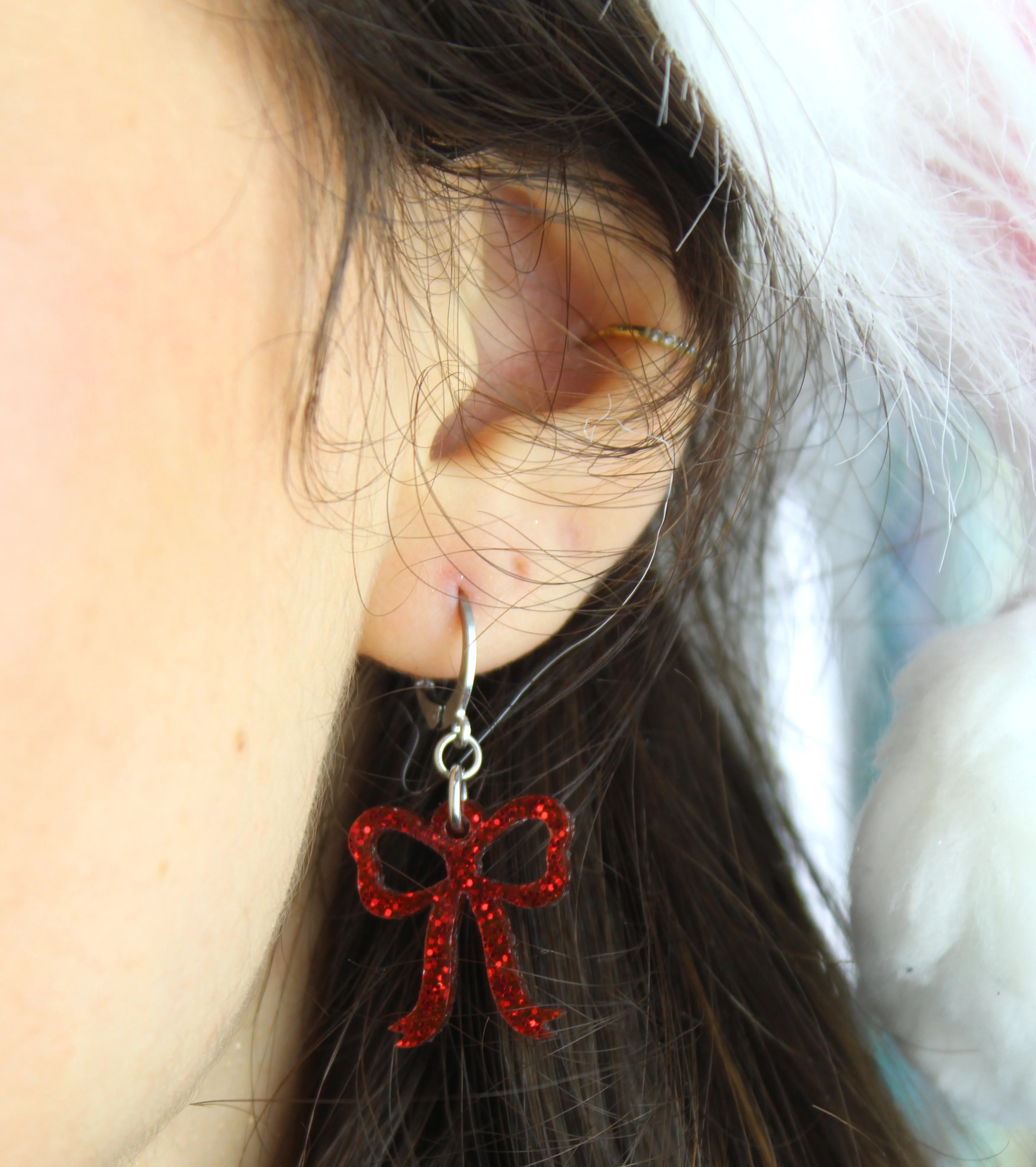 Mini Red Glitter Bow Huggie Hoop Earrings - Image 2
