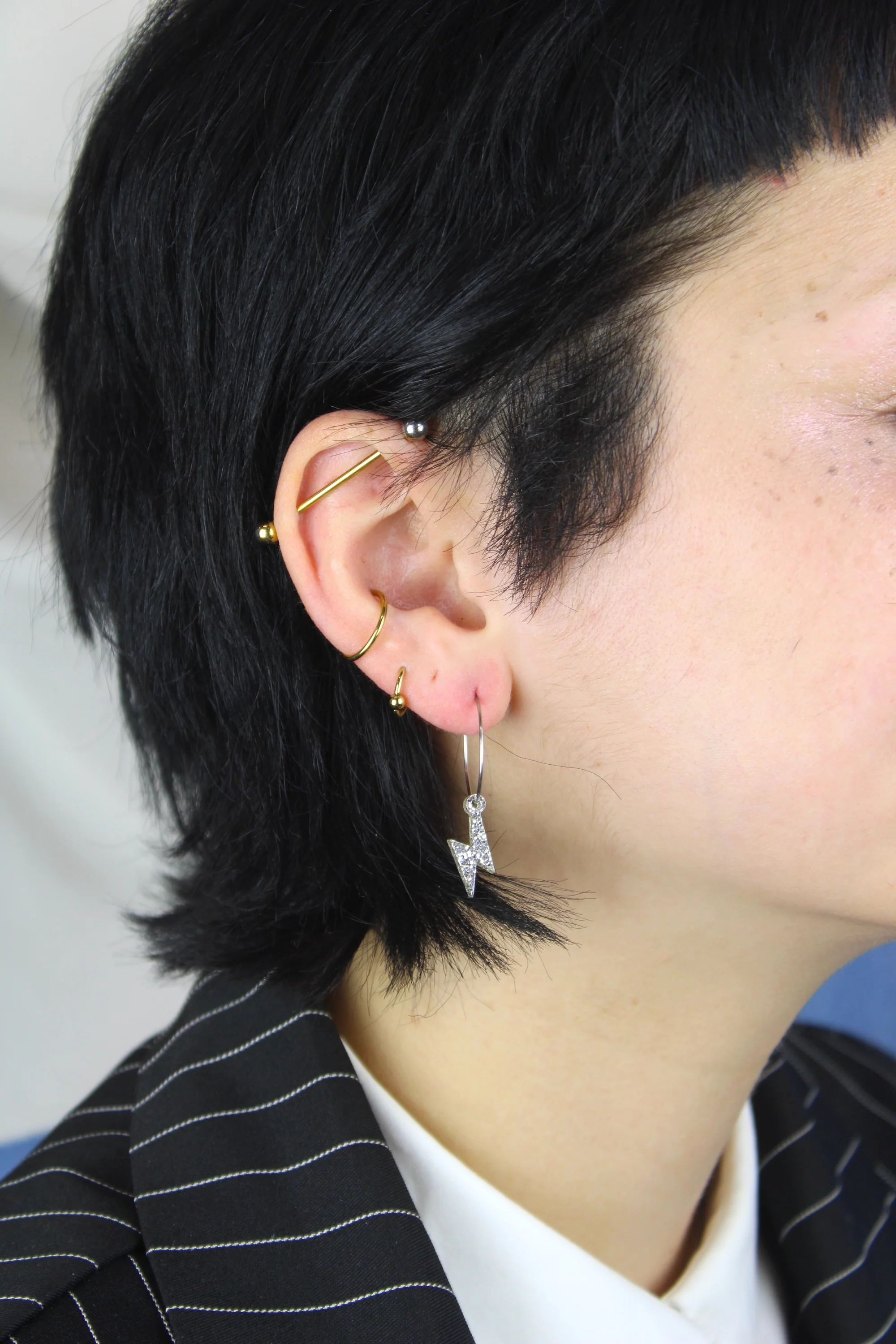 Mini Silver Glitter Lightning Bolt Hoop Earrings - Image 2
