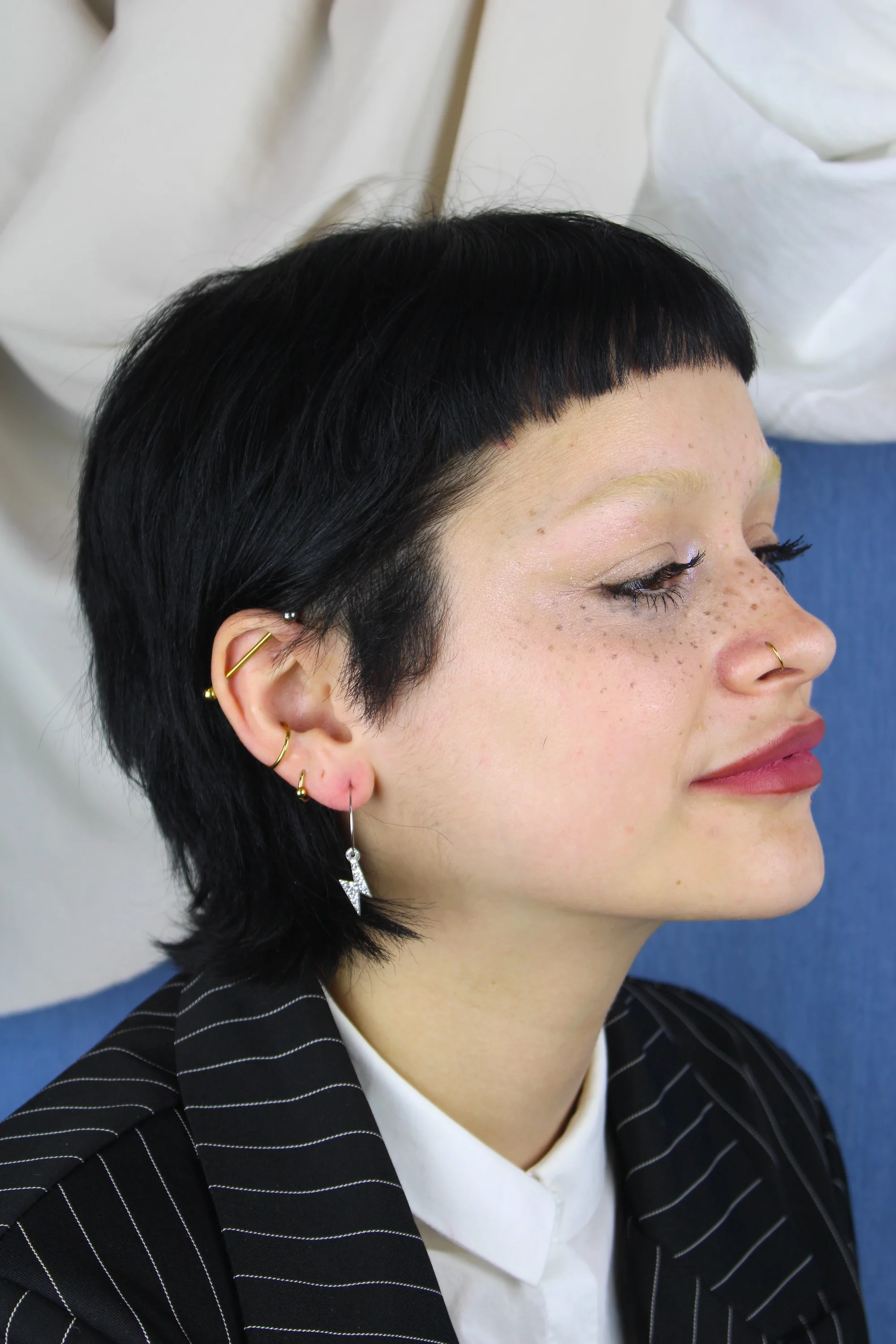 Mini Silver Glitter Lightning Bolt Hoop Earrings - Image 5