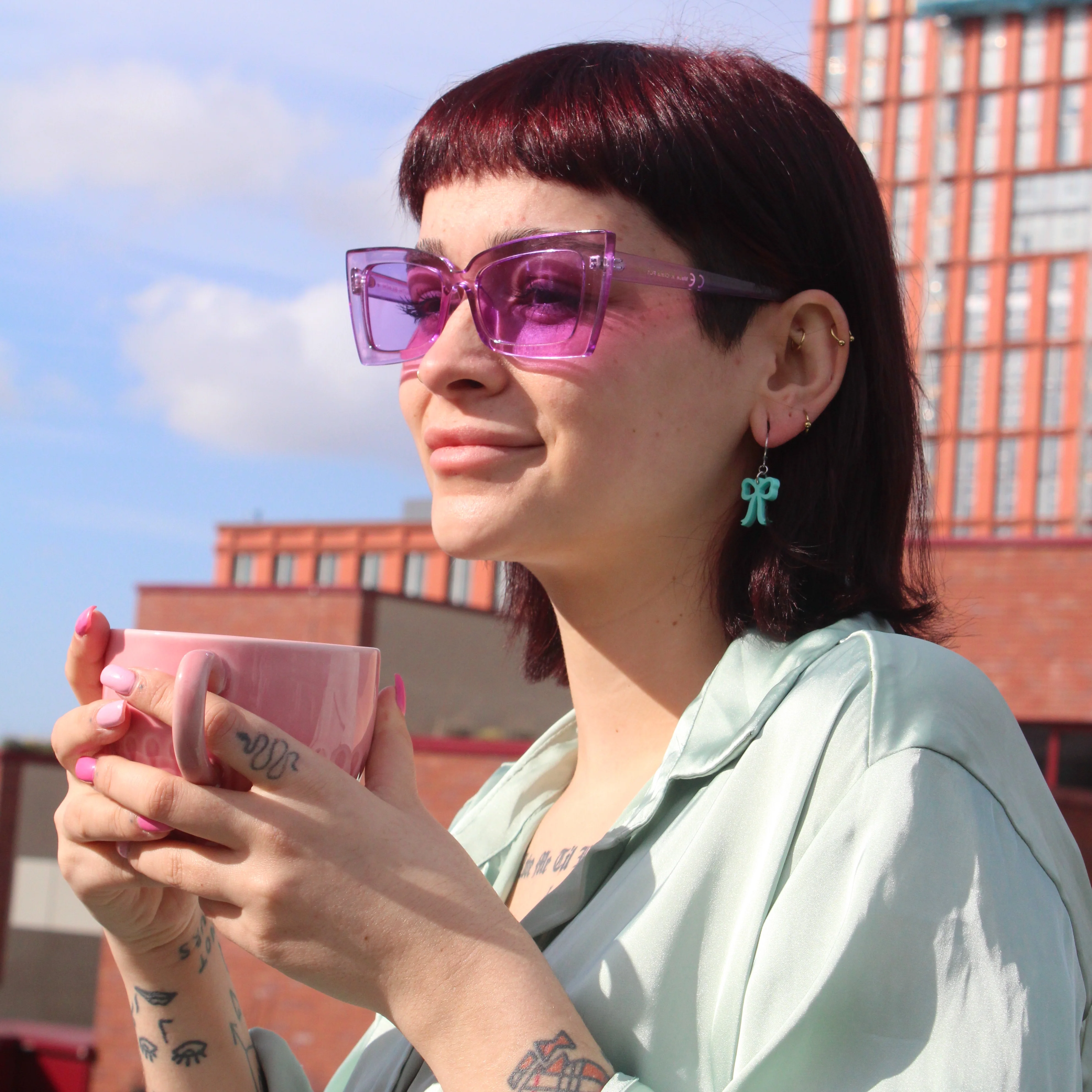 Mini Turquoise Bow Huggie Hoop Earrings - Image 4