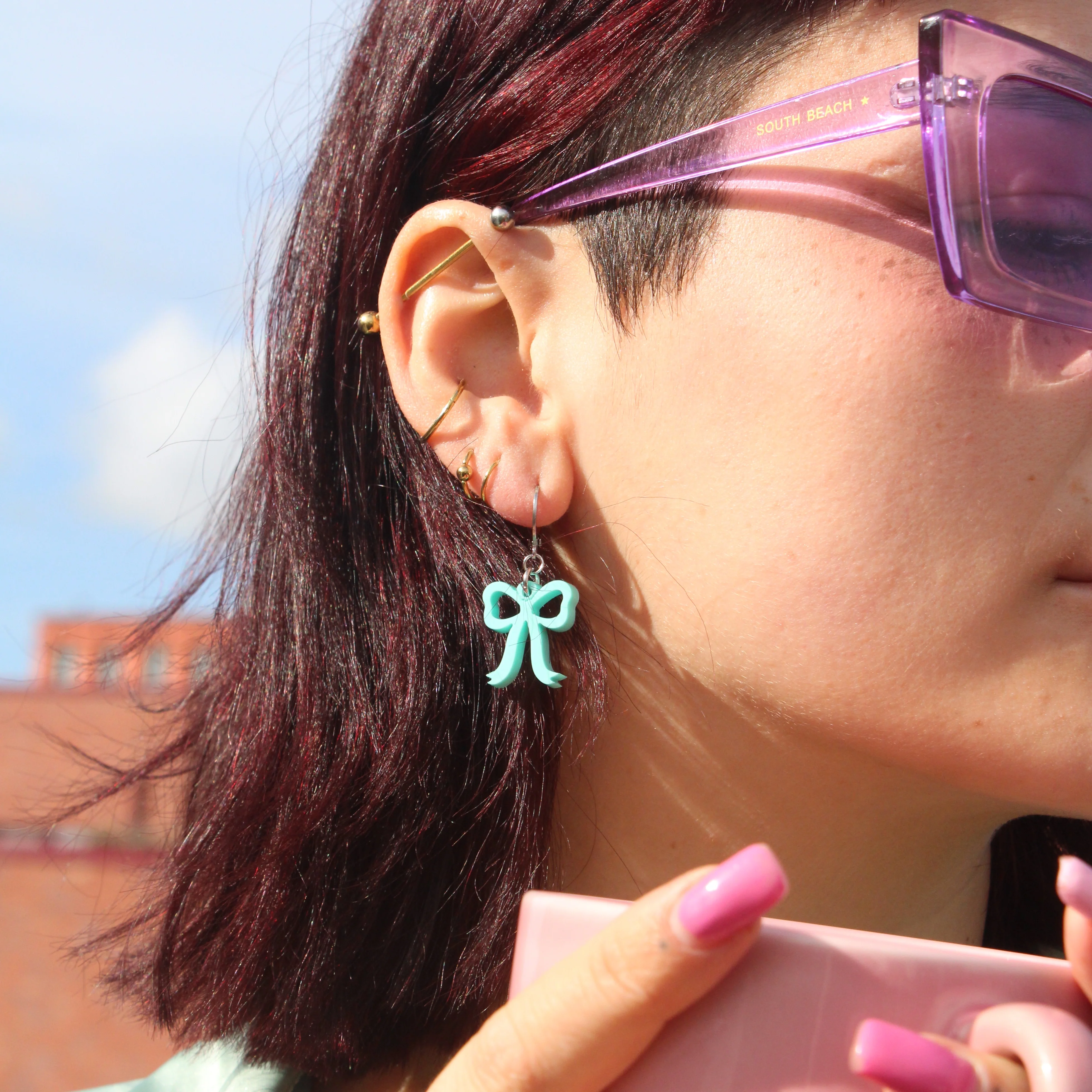 Mini Turquoise Bow Huggie Hoop Earrings - Image 5
