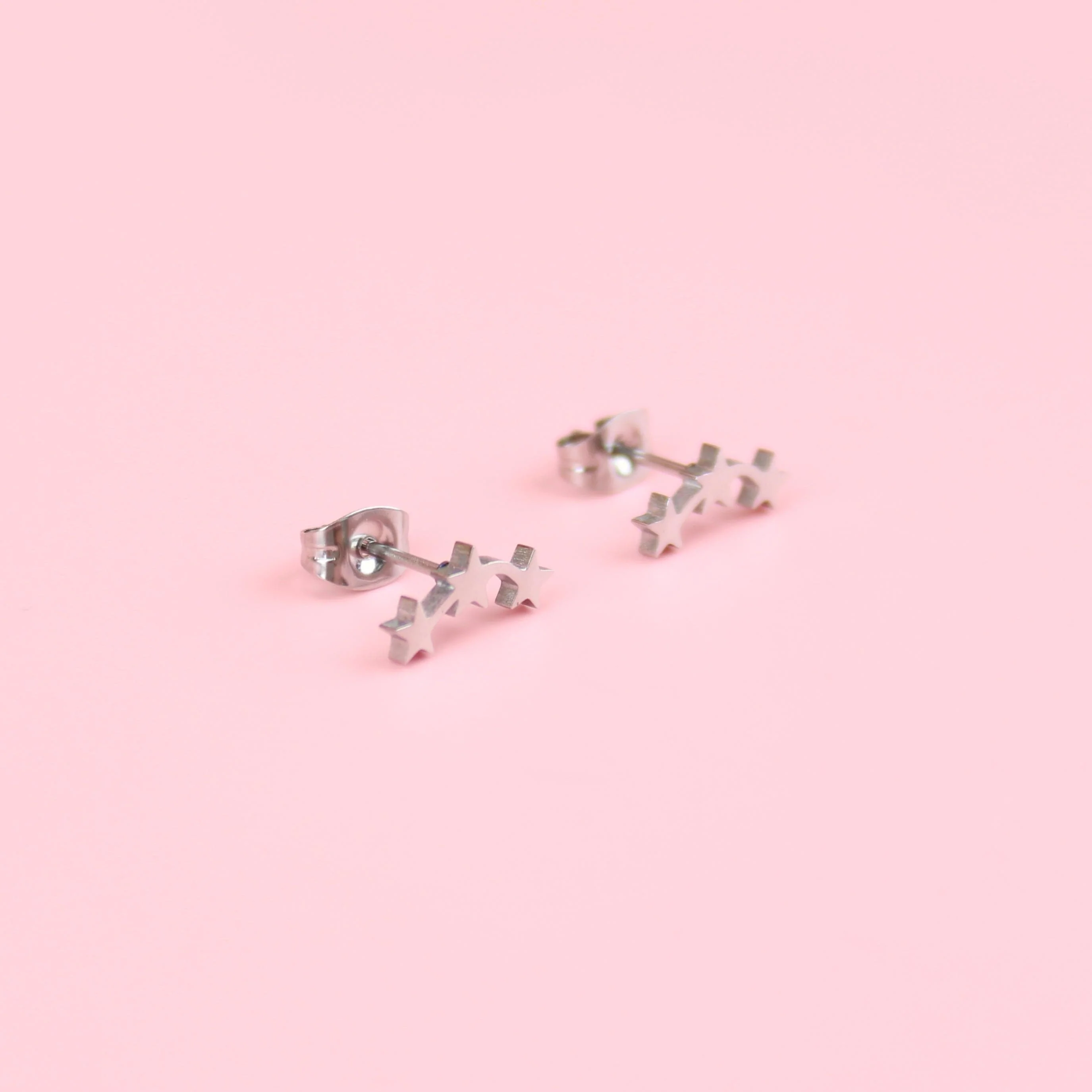 Triple Curved Star Stud Earrings - Image 4